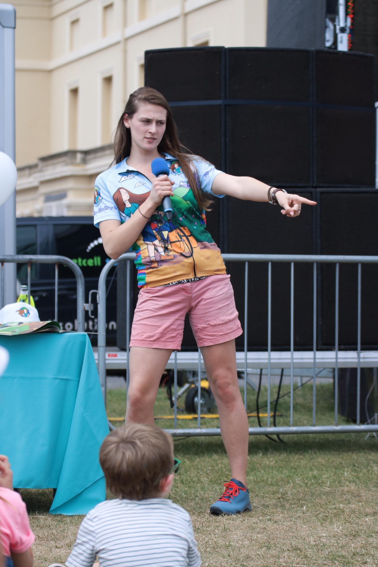 Laura speaking at an outdoor children's book event